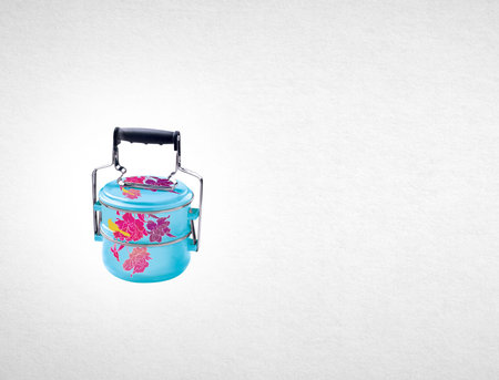 Tiffin or Tiffin carrier on a background