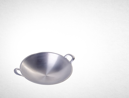 wok or asian cooking wok on a backgroundの写真素材