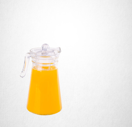 Orange juice or Orange juice in jug on backgroundの写真素材