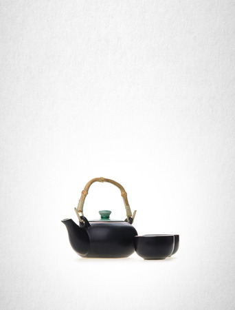 Chinese tea set with cups and tea pot on background.の写真素材