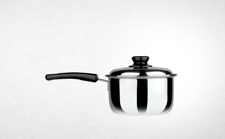 pot or stainless steel cooking pot on a backgroundの写真素材