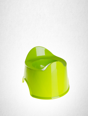 Children's chamber-pot or Plastic chamber-pot on a backgroundの写真素材