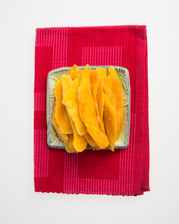 Dried Mango or Dried Mango slices on a backgroundの写真素材