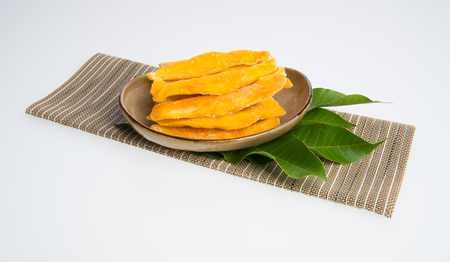 Dried Mango or Dried Mango slices on a backgroundの写真素材