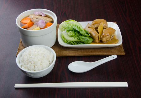 Chicken and herb soup in pot, Chinese food style.の写真素材