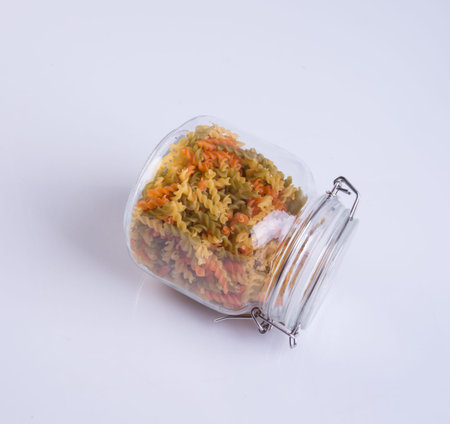 pasta or raw radiatori pasta on a backgroundの写真素材