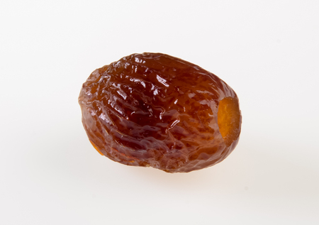 Dried preserved or Sweet syrup monkey apple on backgroundの写真素材