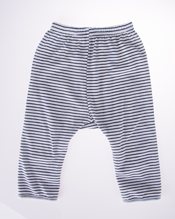 Childrens striped pants isolated on a white background.の写真素材