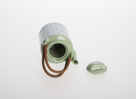 tea pot or ceramic teapot on backgroundの写真素材