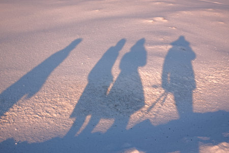 Shadows on the snow; Drekkingarhylur (the Drowning Pool) at Pingvellir National Park , South West Iceland.の写真素材
