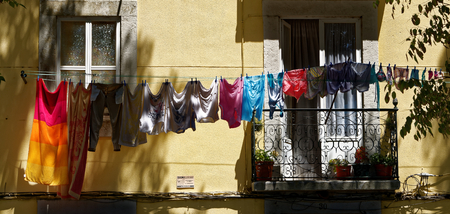 Drying clothes on a balcony, Setubal, Portugal.の写真素材