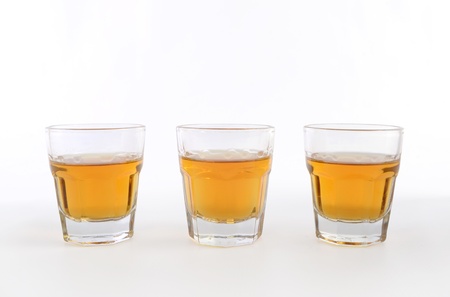 Three whiskey shots cupsの写真素材