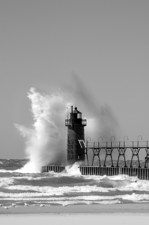 South Haven Lighthouse Pier and Splashの写真素材