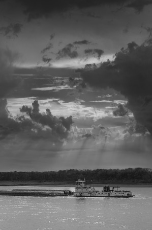 Mississippi River Barge Heading Down River from Memphis to New Orleansの写真素材