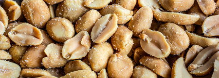 Panoramic view of salted peanuts macro