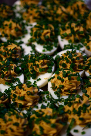 Stuffed eggs sprinkled with chives