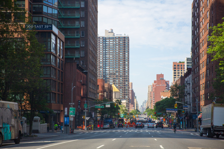 New York - June 2, 2018: A view down a busy avenue street, People walk on busy streetsのeditorial素材