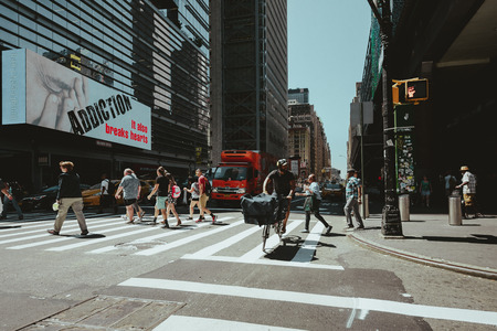 New York, United States, July 19, 2018: New York City street road in Manhattan, is a busy tourist intersection of neon art and commerce and is an iconic street of New York City and Americaのeditorial素材