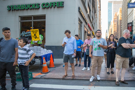 New York, United States, July 19, 2018: New York City street road in Manhattan, is a busy tourist intersection of neon art and commerce and is an iconic street of New York City and Americaのeditorial素材