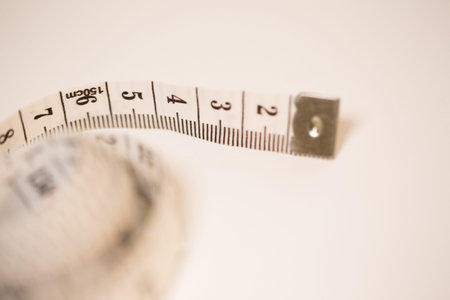 Measure tape white isolated on white background