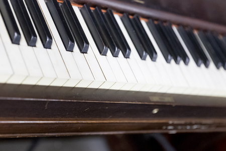 Vintage old piano. Close-up of keyboard keysの写真素材