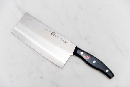 Princeton New Jersey - April 18, 2019: JA Henckels, Zwilling Twin Signature Cleaver, 7" on the table.のeditorial素材