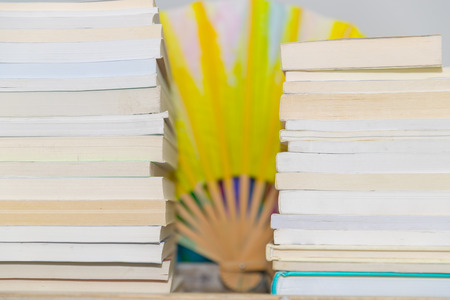 Stack of colorful books on background - Imageの写真素材