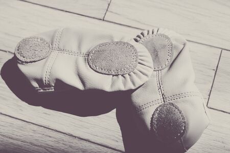 Closeup of a pair of dance shoes, ballet pointe shoes, and character shoes representing of dance classes in one image. - Imageの写真素材