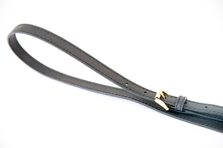 Black leather fastening belt, strap isolated on white background-Image