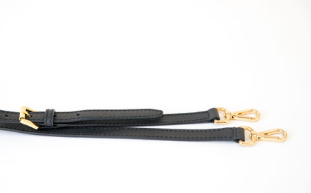 Black leather fastening belt, strap isolated on white background-Image
