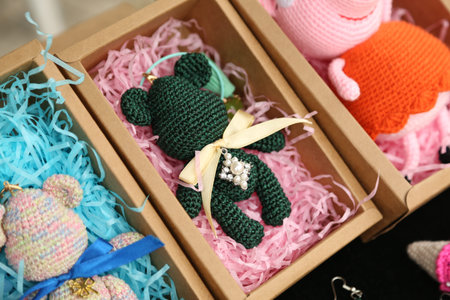 Cute knitted toy bears in box
