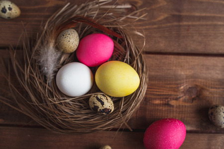 Easter eggs on rustic wooden background. Easter greeting cardの写真素材
