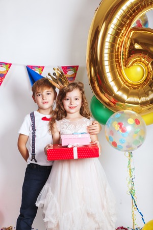 Group of kids celebrate birthday party togetherの写真素材