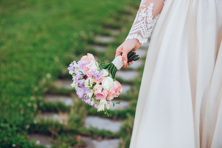 Bride bouquet . Beautiful wedding bouquet in the bride's handsの写真素材