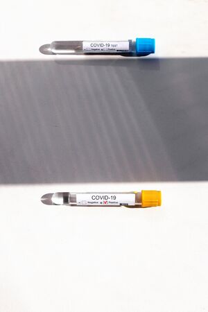 Covid-19 Blood Sample on white background. Covid-19 test conceptの写真素材