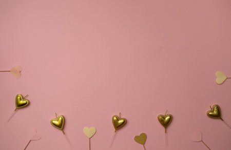 Golden hearts on pink background. Birthday invitation cards. Love concept.の写真素材