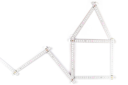 white meter tool forming a house on white backgroundの写真素材