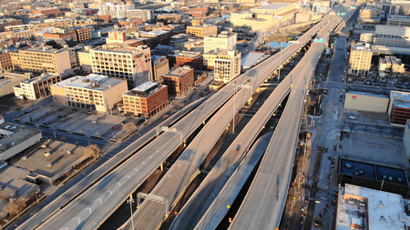  Aerial view of american city at dawn. High-rise  buildings, freeway, bay.  Sunny morning. Milwaukee, Wisconsin, USA
の写真素材
