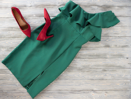 Womens clothes and shoes (Red green dress, pumps). Fashion outfit for christmas, evening, night out. Template for online store, website, banners. Flat lay, top down viewの写真素材