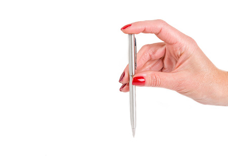 woman's hand with pen writting in notebookの写真素材