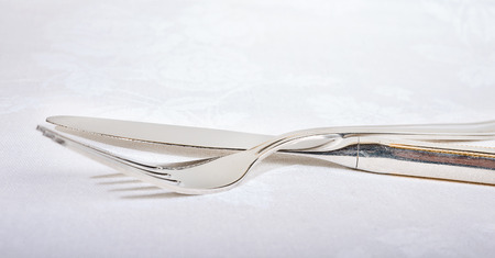 Kitchen towe, fork l and   knifeの写真素材
