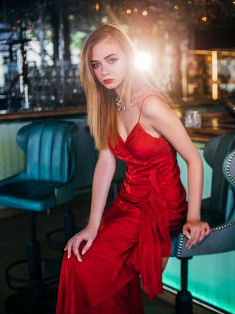 party photo of elegance sexy lady in red dressの写真素材