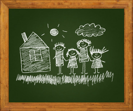 Happy parents and children. Naive blackboard kids drawingの写真素材