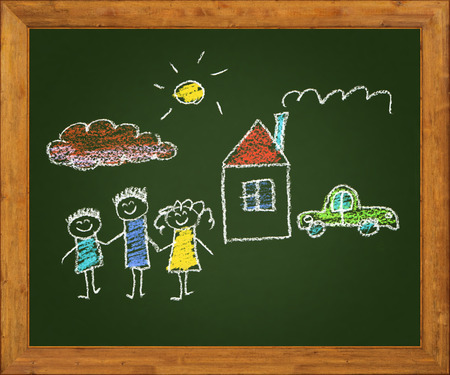 Happy parents and children. Naive blackboard kids drawingの写真素材