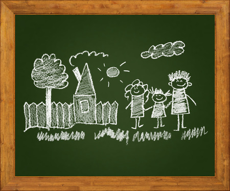 Happy parents and children. Naive blackboard kids drawingの写真素材