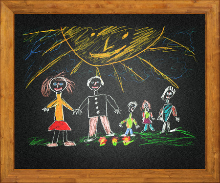 Happy parents and children. Naive blackboard kids drawingの写真素材