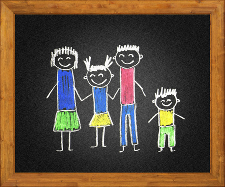 Happy parents and children. Naive blackboard kids drawingの写真素材