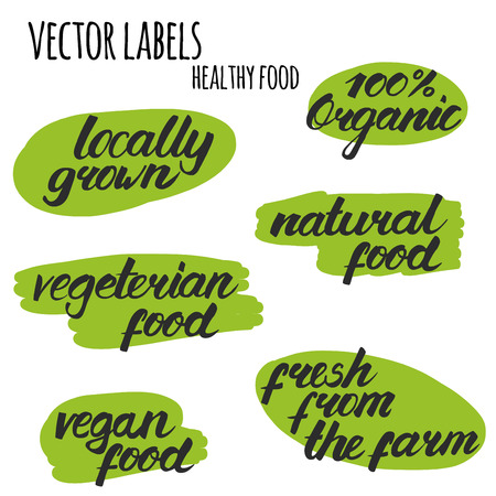 Vector labels with hand drawn letters Healthy food elementsのイラスト素材