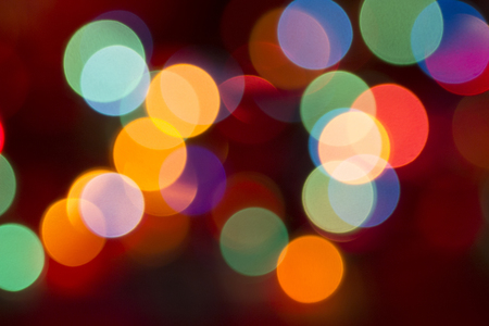 christmas lights abstract green orange blue blurredの写真素材