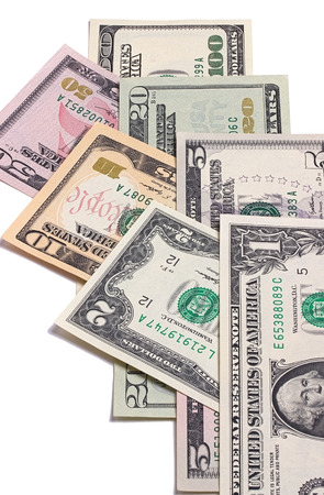 US american dollar money bills isolated on white backgroundの写真素材